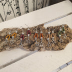 Boucles d'oreilles en liege coloré avec une étoile idéal pour tous les jous