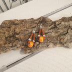 Boucles d'oreilles en liège orange et perles en céramique - vue de dessus