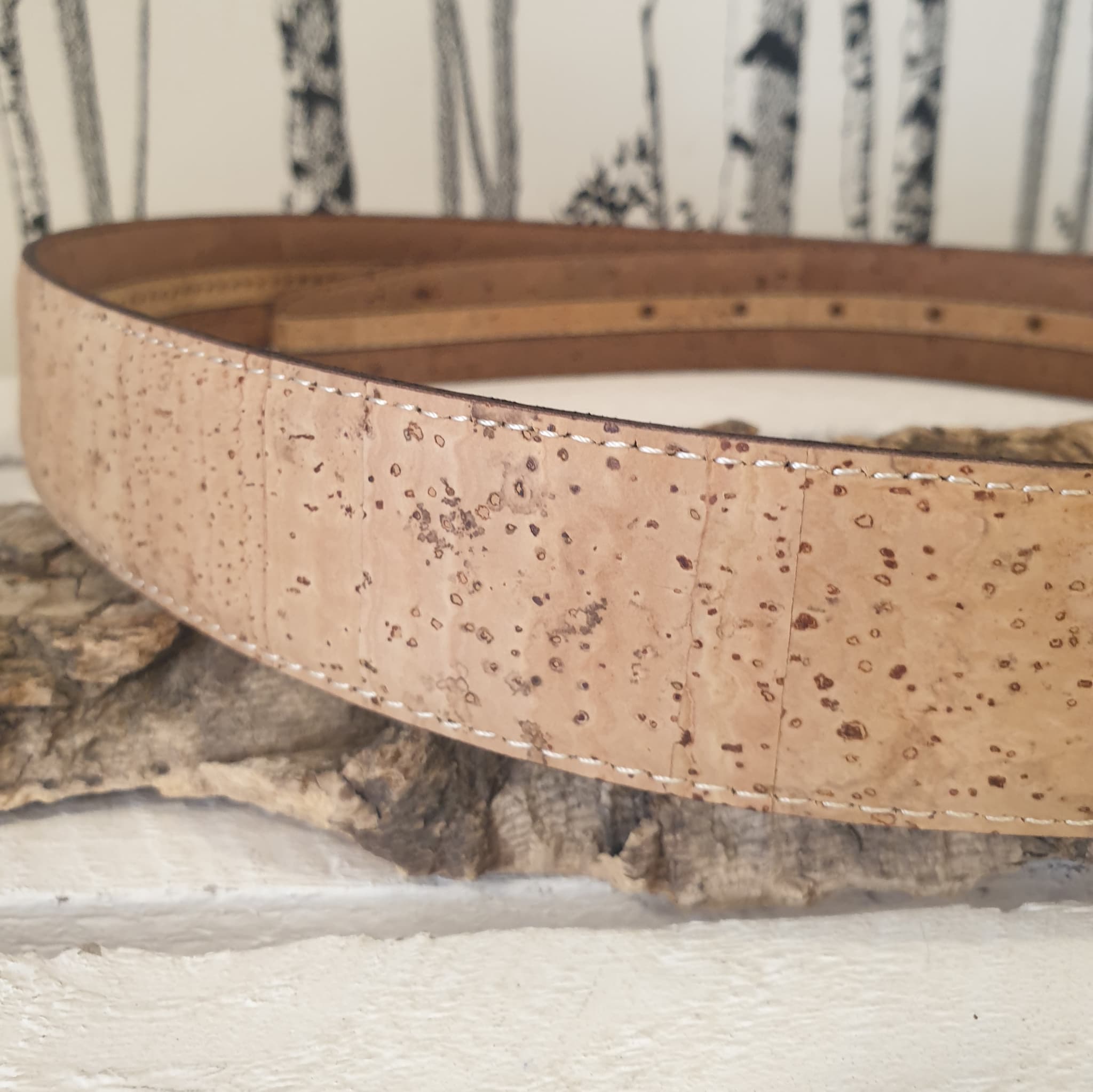 Zoom sur le côté réversible de la ceinture Auren