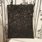 vue arrière pochette à livre noir doré