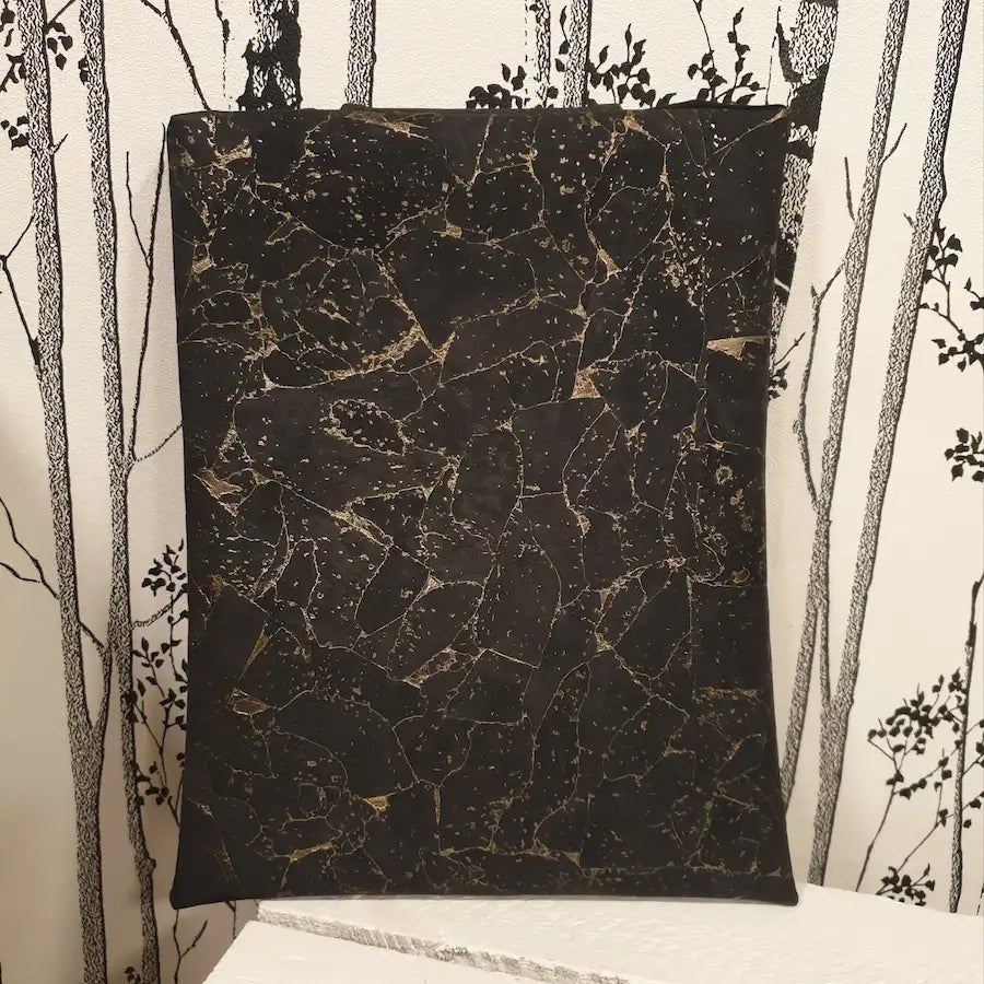 vue arrière pochette à livre noir doré